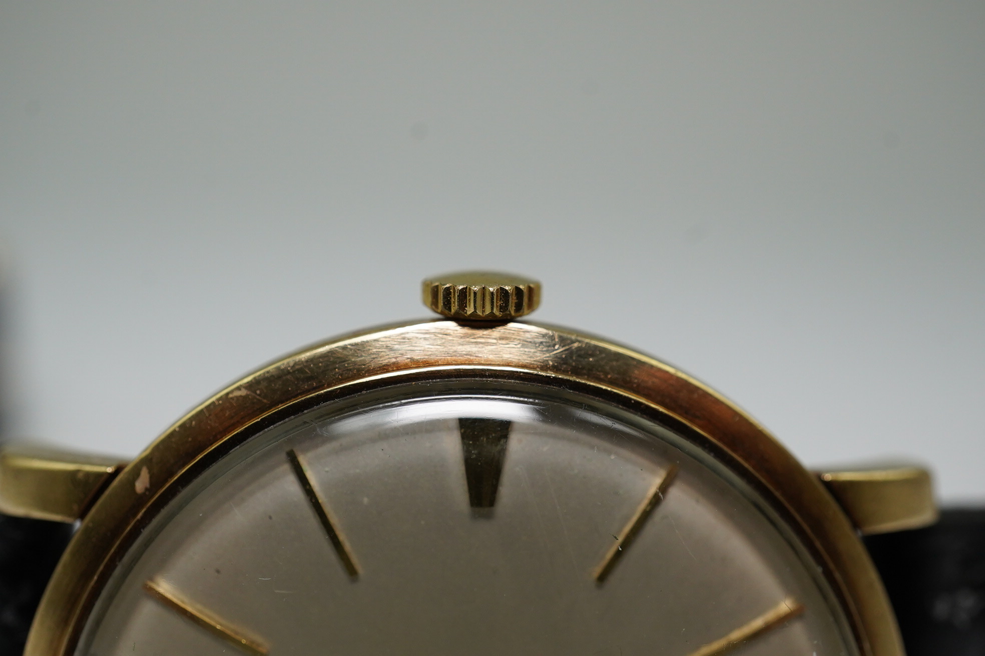 A gentleman's late 1950's 9ct gold Omega manual wind wrist watch